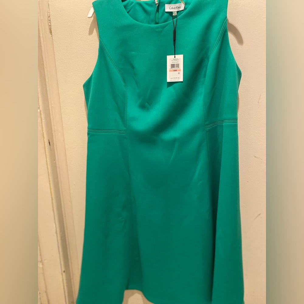 This is a green Calvin Klein dress.